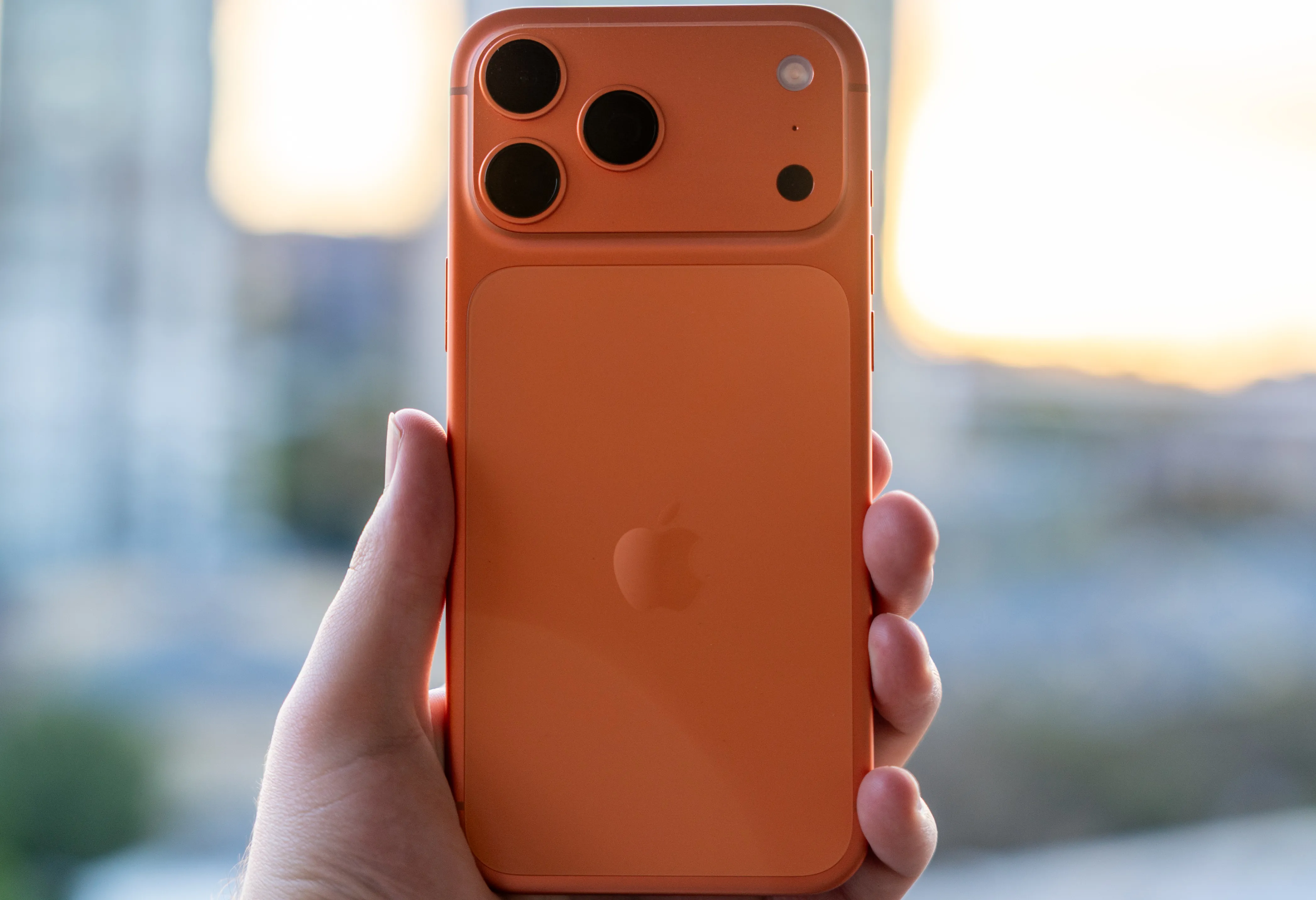 iPhone 17 Pro Max Held in Hand, back towards camera